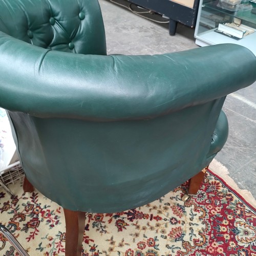 396a - 19th century Antique horse filled leather button back tub chair .