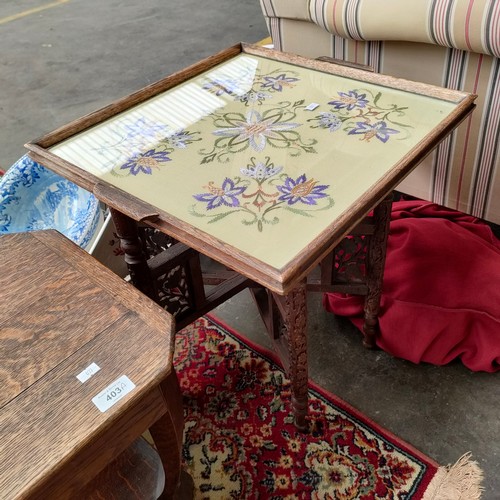 403a - Eastern based table with marriage tray top together with oak table .