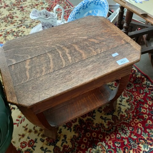 403a - Eastern based table with marriage tray top together with oak table .