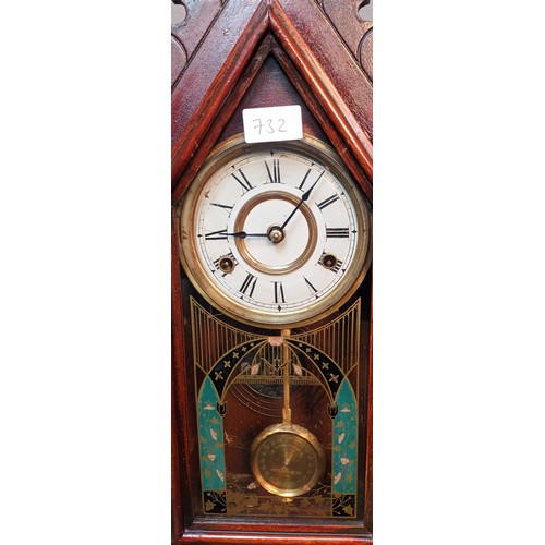 732 - Antique American Ginger bread clock, Comes with key and pendulum. In a working condition. [57cm high... 