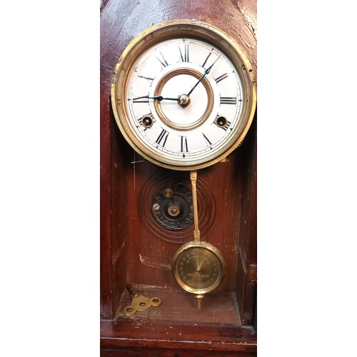 732 - Antique American Ginger bread clock, Comes with key and pendulum. In a working condition. [57cm high... 