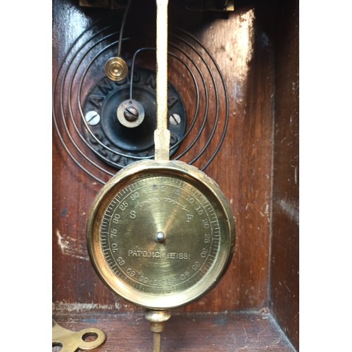 732 - Antique American Ginger bread clock, Comes with key and pendulum. In a working condition. [57cm high... 