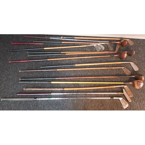 734 - Hickory shafted golf clubs within leather bound carrier, some to include various branded names from ... 