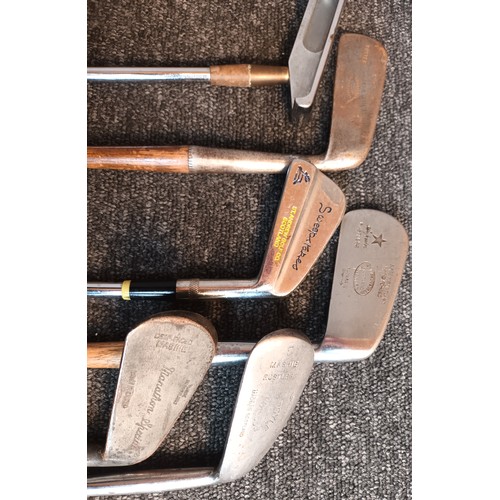 734 - Hickory shafted golf clubs within leather bound carrier, some to include various branded names from ... 