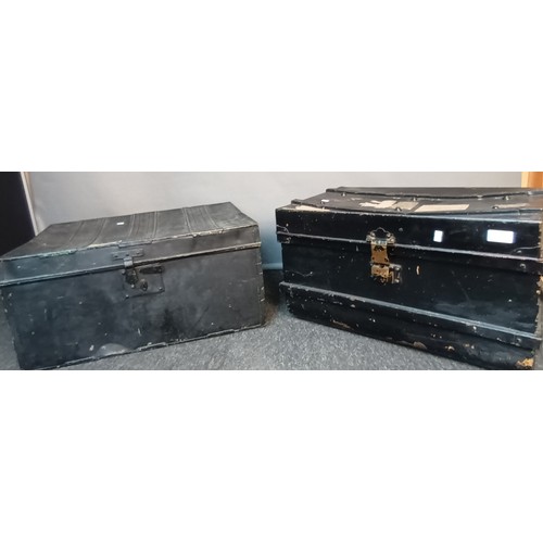 738 - Two vintage military black metal boxes, one with the initials DGMC [32X66CM]