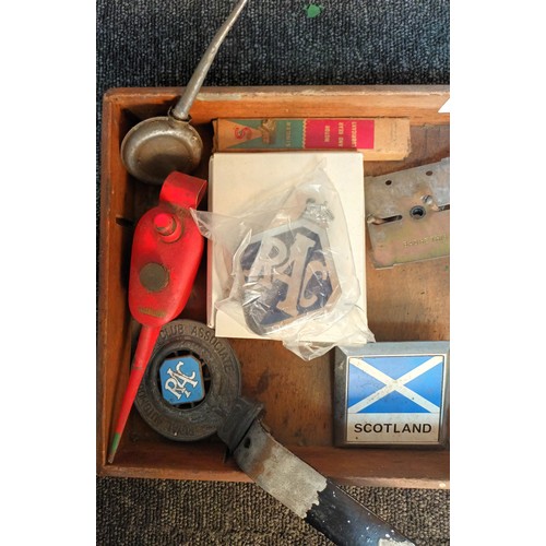 742 - Wooden tray containing motoring memorabilia to include AA and RAC Badges, Oil dispensers and Scotlan... 