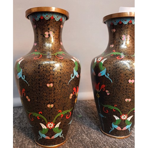 743 - A Pair of Chinese Cloisonné vases. [23cm high] [Will post]