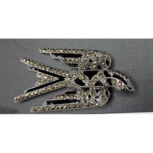 24A - A silver marcasite and enamel swallow brooch-pendant