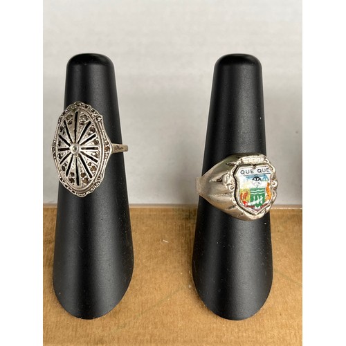 41 - Five various silver rings. Includes art deco design ring, silver and enamel floral ring, Indian swiv... 