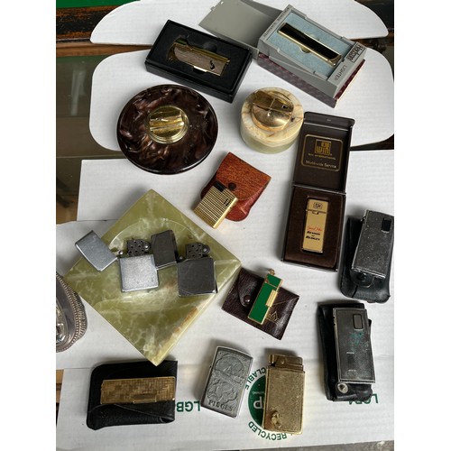 52 - Collection of vintage lighters and onyx ashtray to include two zippo lighters and ronson desk lighte... 