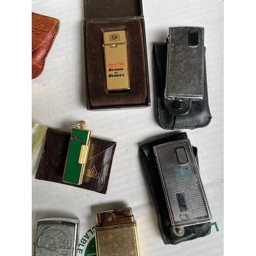 52 - Collection of vintage lighters and onyx ashtray to include two zippo lighters and ronson desk lighte... 