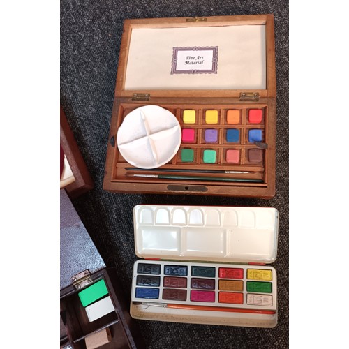 902 - Four various boxes and tins containing paint and utensils. Includes German tin plate paint set & Art... 