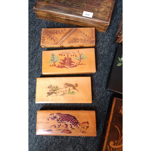 915 - A Collection of arts and crafts boxes.