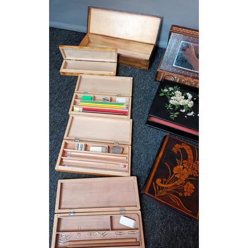 915 - A Collection of arts and crafts boxes.