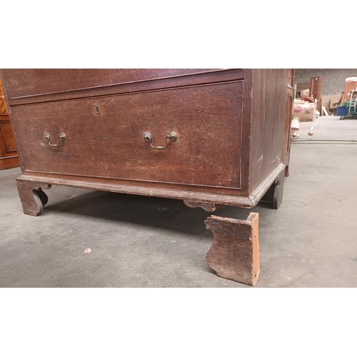 760 - Antique oak cabinet, the rectangular top with moulded edging above two short drawers and three gradu... 