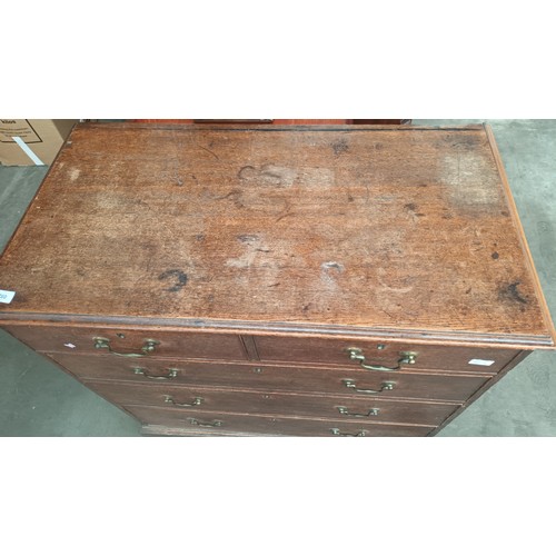 760 - Antique oak cabinet, the rectangular top with moulded edging above two short drawers and three gradu... 