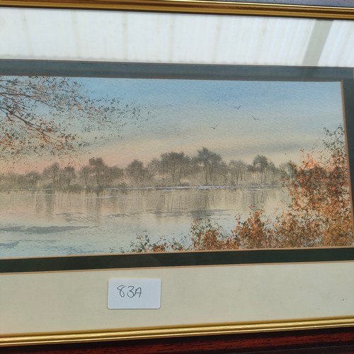 83a - Water colour depicting birds flying over lake signed P . Swindells .