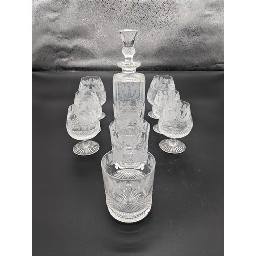 560 - Edinburgh crystal thistle cut decanter together with nine thistle cut glasses