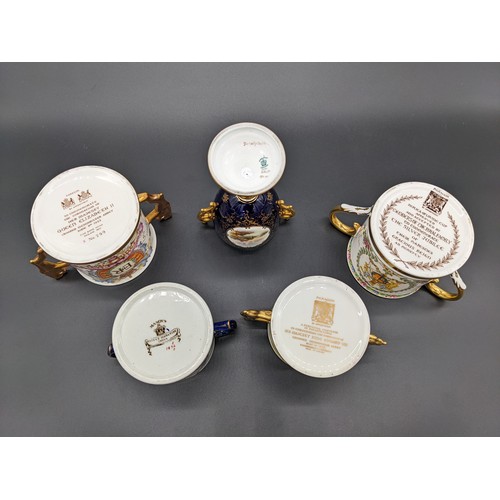 720 - Collection of double handled cups to include Paragon, Mason's and Coalport