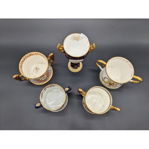 720 - Collection of double handled cups to include Paragon, Mason's and Coalport