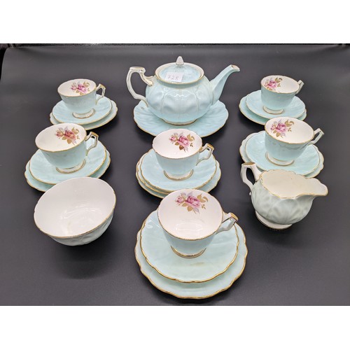 728 - 23 piece Aynsley bone china tea set with teapot, plate, sugar and cream in a blue and floral design