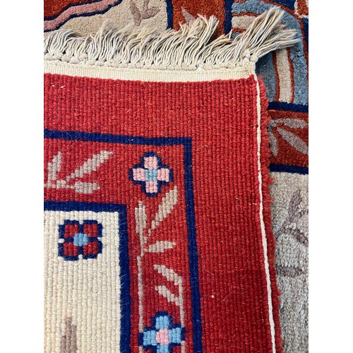 842 - Large and heavy antique hand woven living room rug. []