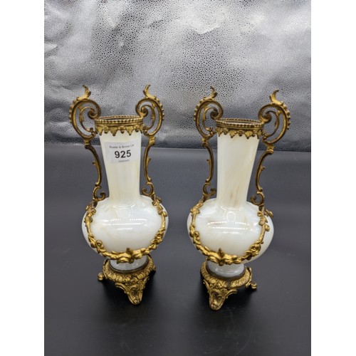 925 - Pair of neo classical vases, the opaline vase encased by gilt floral surround and base [23cm]