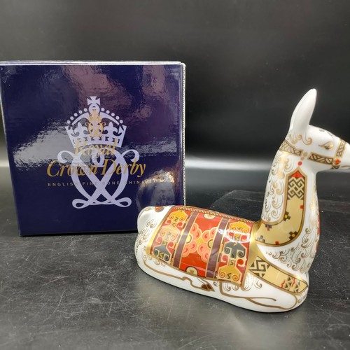 66 - Royal crown Derby paperweight Llama with stopper and box . 13 cm in height by 12 cm in length .