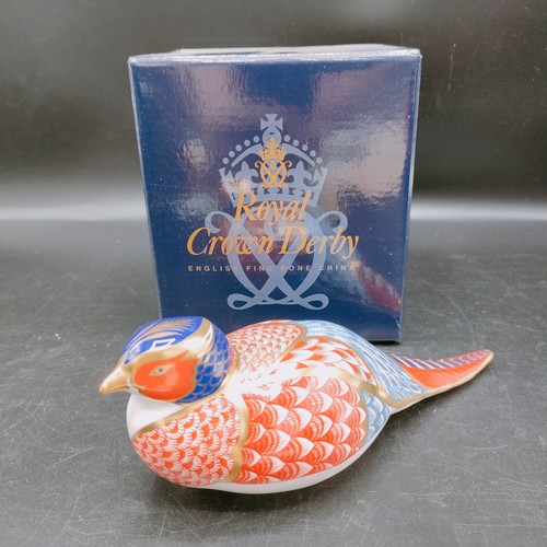 102 - Royal crown Derby pheasant paperweight with stopper and box. 18 cm in length.