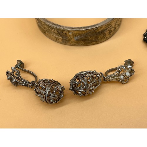 11 - Chester silver bangle, together with a pair of 925 silver earrings and Filigree silver egg shaped ea... 