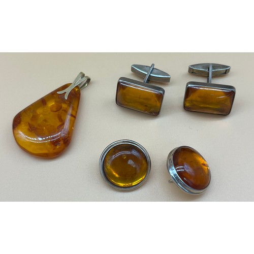 17 - Silver and amber earrings, Silver and amber cuff links and 835 silver gilt and amber pendant. [Will ... 