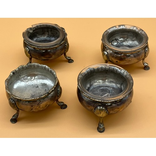 20 - Four 19th century Scottish silver three foot condiment pots, three with glass liners. [218.35grams] ... 