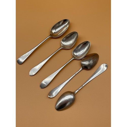 22 - Four antique silver tea spoons together with London silver tea spoon. [72.89grams] [Will post]