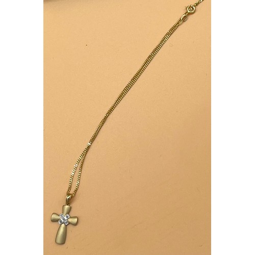 31 - 9ct gold cross pendant together with a 9ct gold necklace. Cross is fitted with five diamonds. [3.93g... 