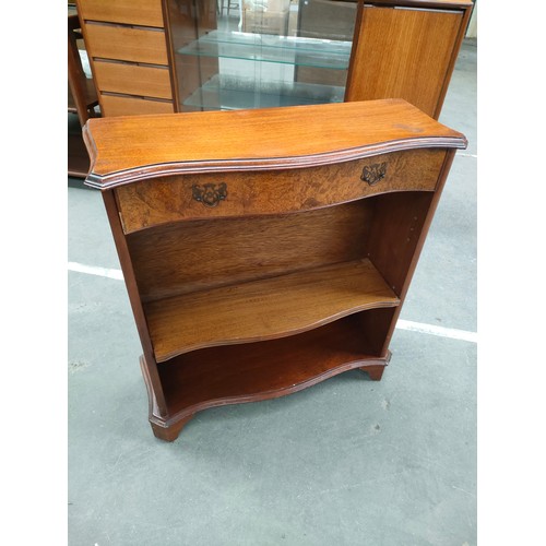 202 - Mahogany and Bur walnut bow front bookcase with fitted drawers.