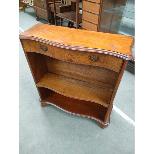 202 - Mahogany and Bur walnut bow front bookcase with fitted drawers.