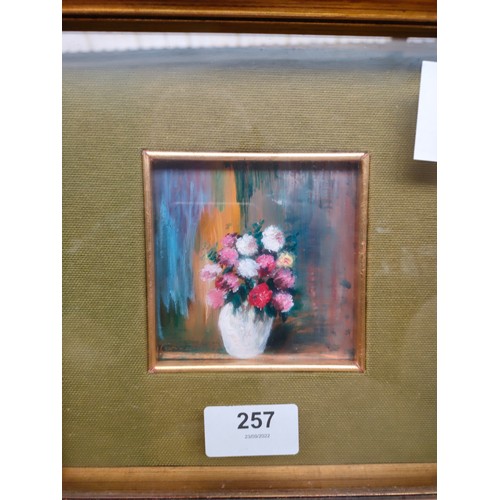 257 - 3 paintings on copper depicting countryside and basket of flower scenes set in framing. Signed.