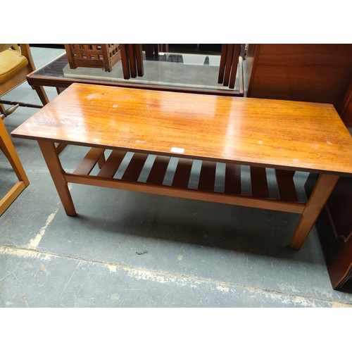 245 - Mid century danish style magazine rack table .