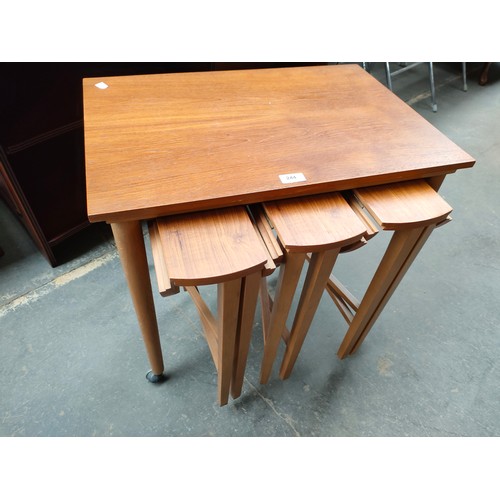 244 - Mid century nest of folding tables.