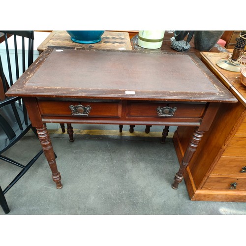 232 - 19th Century antique mahogany writing desk with brown leather top.