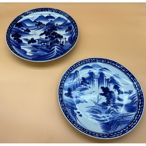 547 - Two Chinese blue and white wall chargers, both with Export approval seals. [37.5cm in diameter]