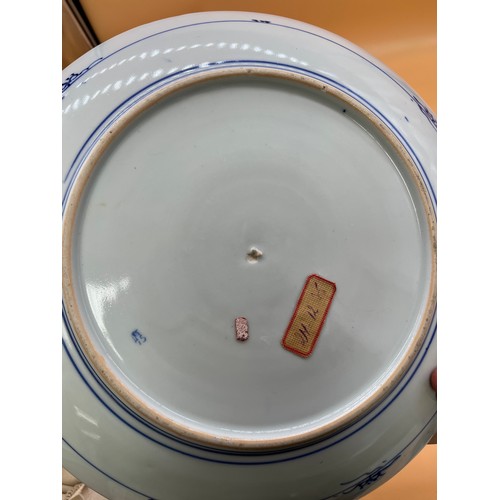 547 - Two Chinese blue and white wall chargers, both with Export approval seals. [37.5cm in diameter]