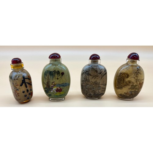 549 - Four Chinese painted perfume/ snuff bottles [9cm high]