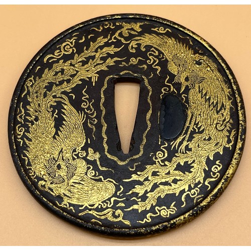 552 - Antique Japanese bronze Tsuba depicting Pheonix design. [8.2cm in diameter]