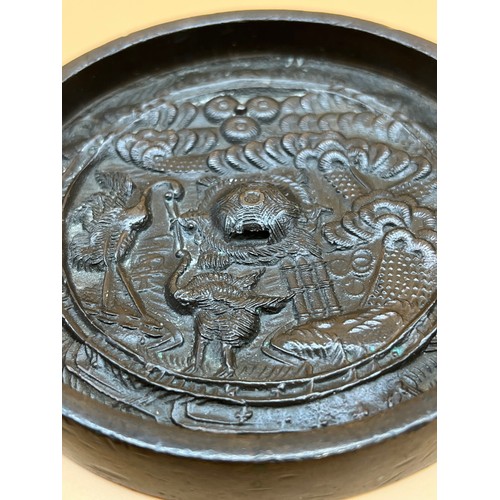 553 - Antique Chinese Bronze Circular Mirror, detailing turtle and birds [11.7cm in diameter]