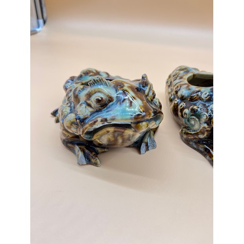 569 - Two Chinese drip glaze toad shaped pots. [17cm in length] [As found in areas]