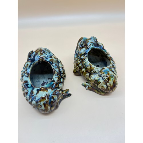 569 - Two Chinese drip glaze toad shaped pots. [17cm in length] [As found in areas]