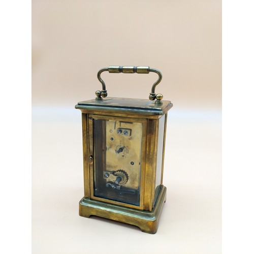 576 - Antique French brass carriage clock with single drum movement, within case