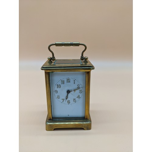 576 - Antique French brass carriage clock with single drum movement, within case