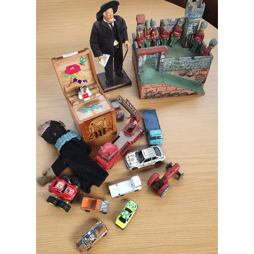 116A - A Collection of Vintage toys to include play worn cars, puppet and a  Fort with Wooden Soldiers.